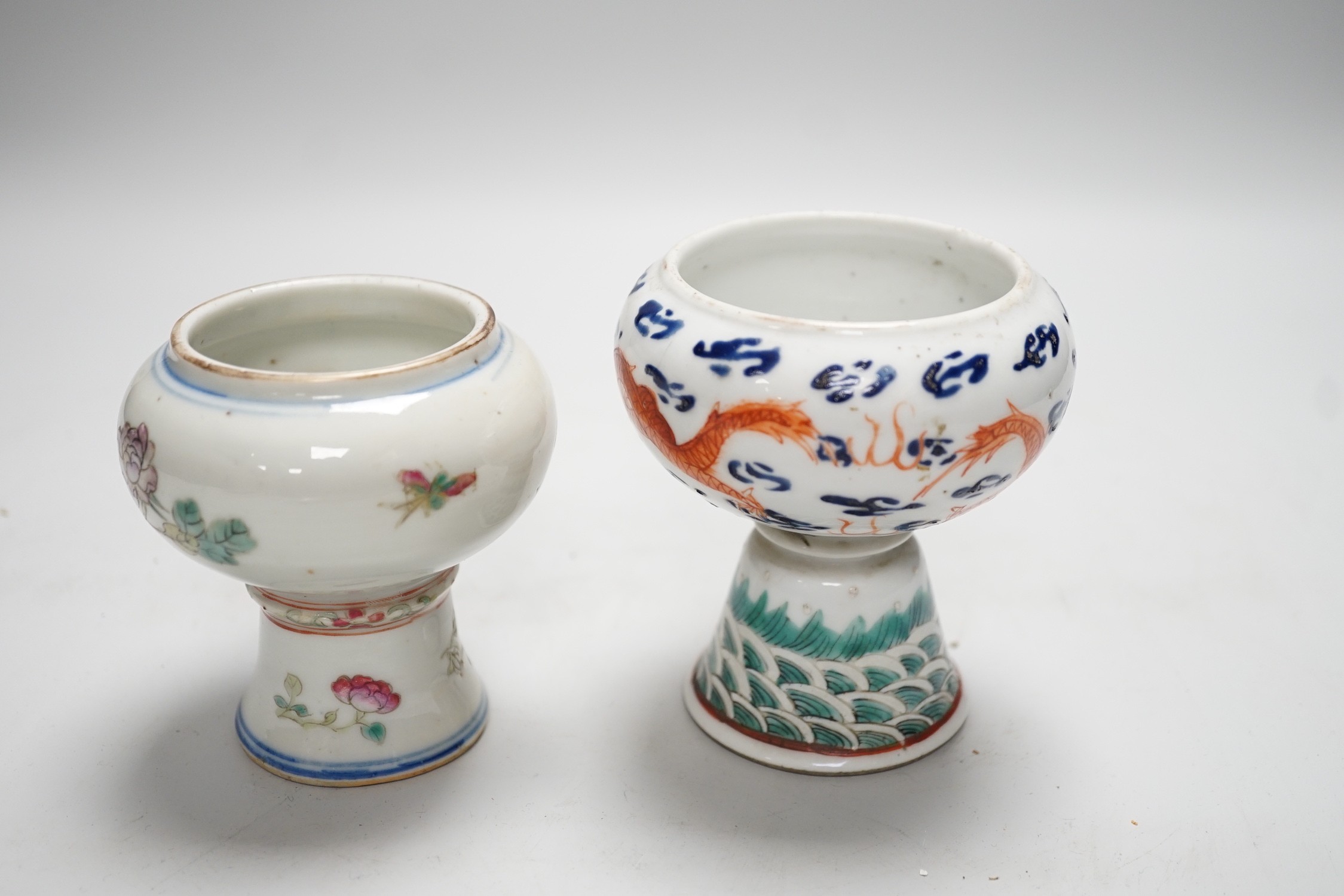 Two 19th century Chinese enamelled porcelain stem bowls, The first painted with Dragons chasing a flaming pearl, 10cm, the second painted with a bird amid flowers